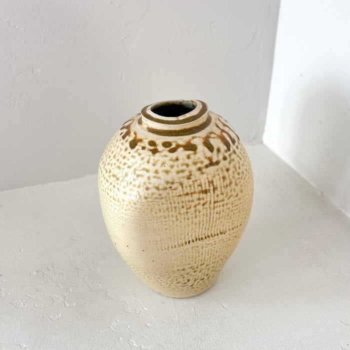 Cream pottery vase