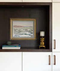 Sculptural brass candle holder