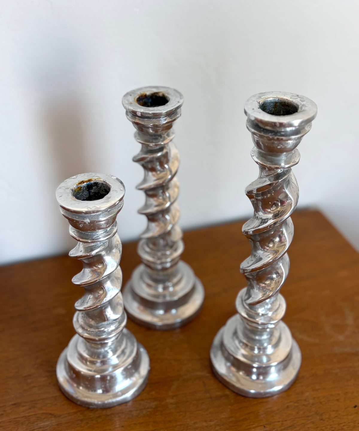 Twisted pewter candlesticks