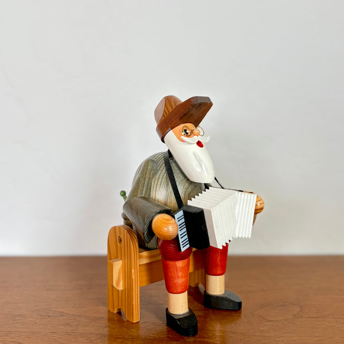 Accordion player smoker man