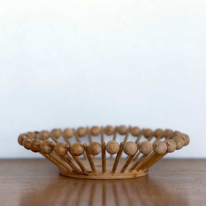 Wood ball and stick bowl