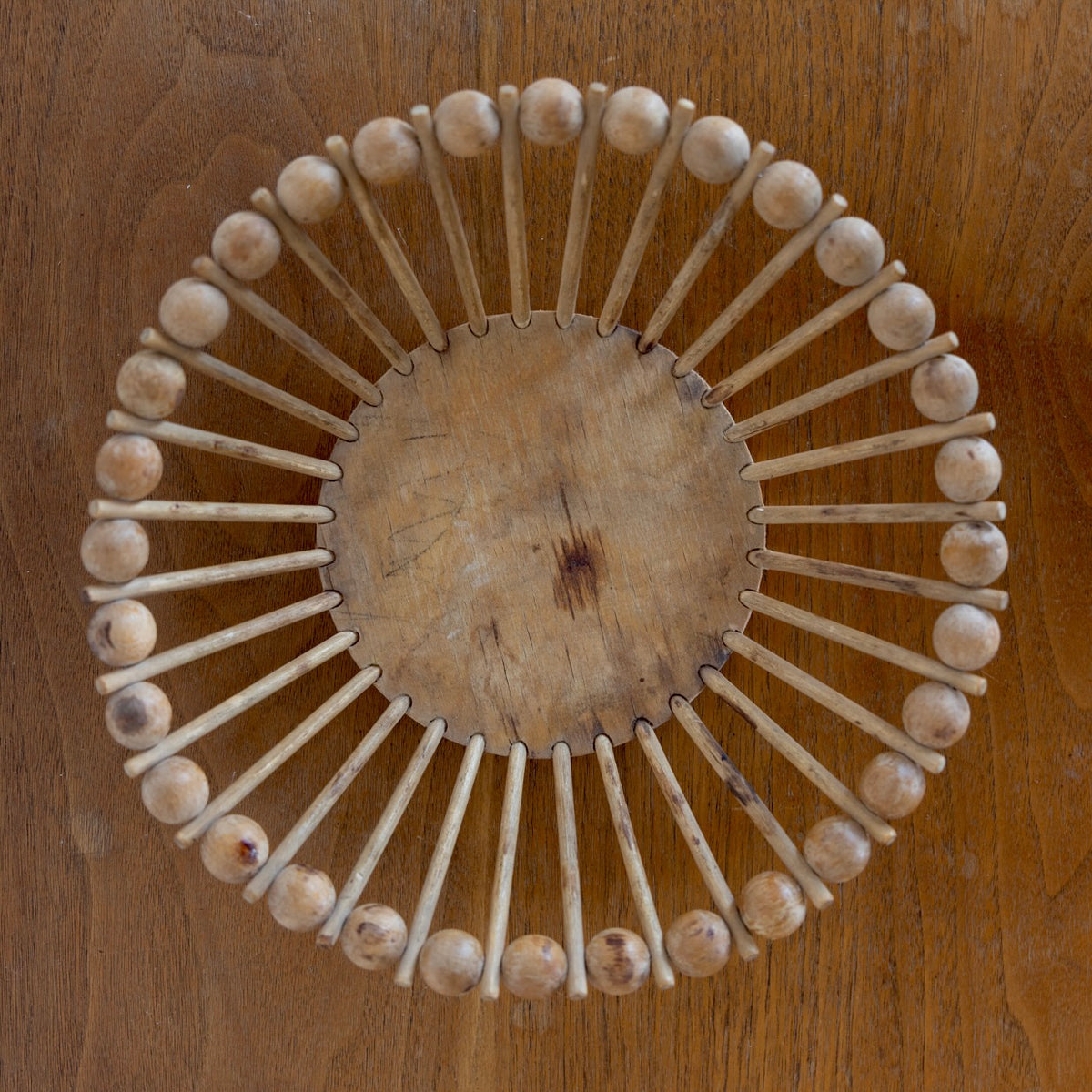 Wood ball and stick bowl