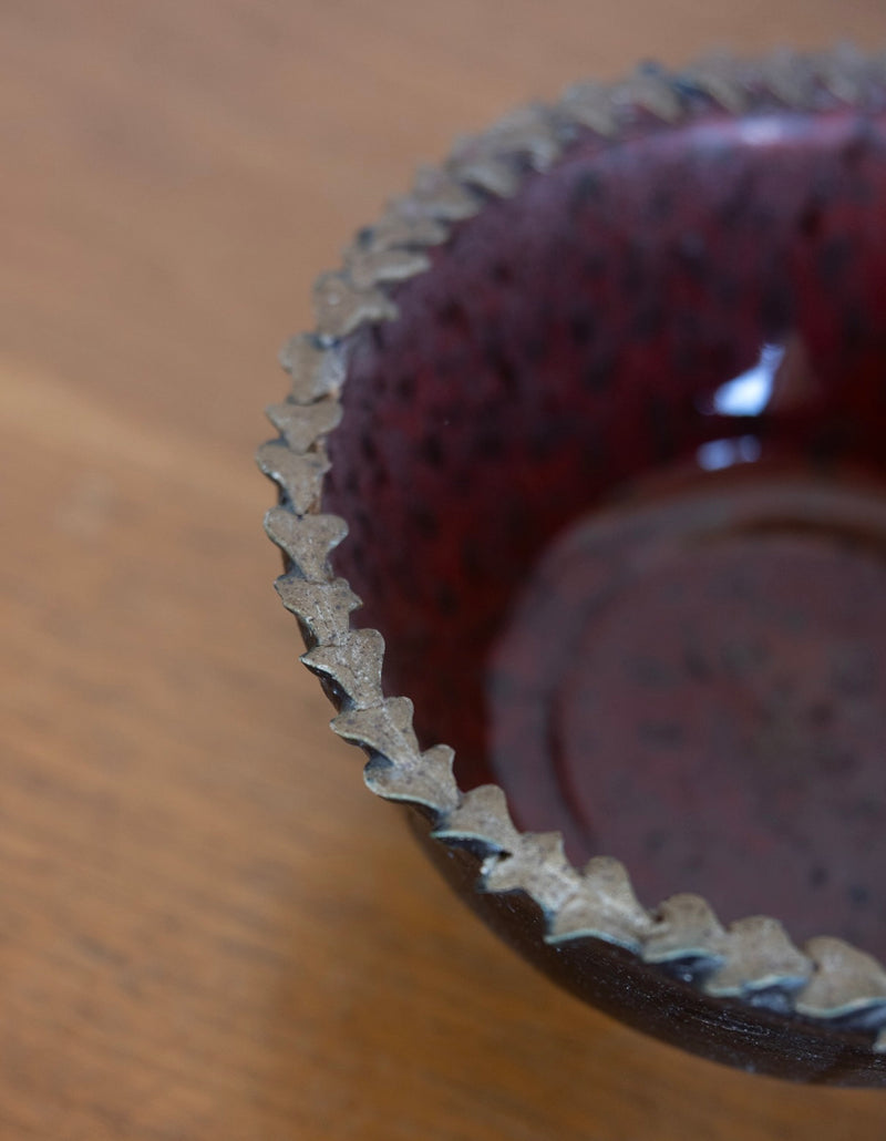 Speckled pottery bowl