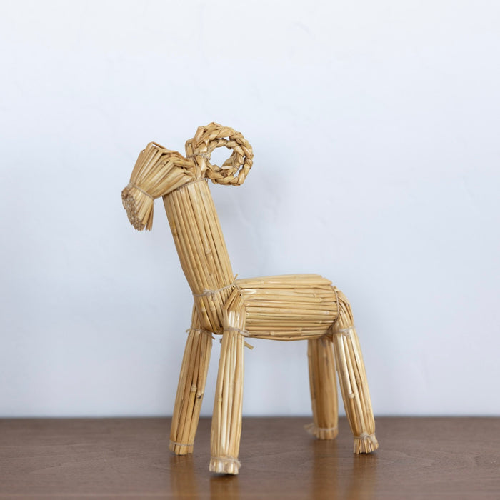 Straw goat sculpture