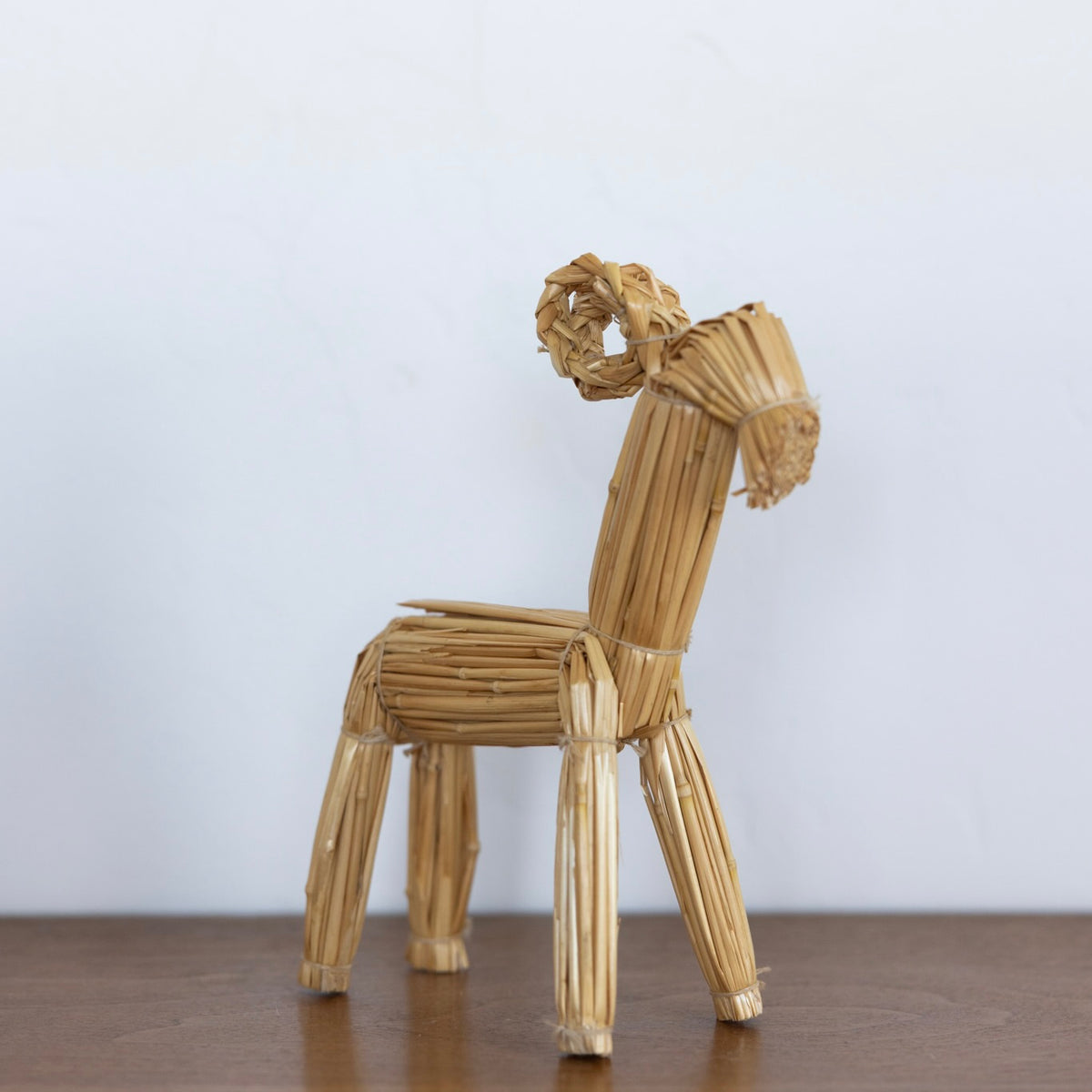 Straw goat sculpture