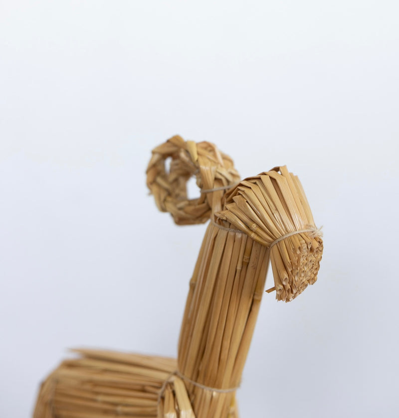 Straw goat sculpture