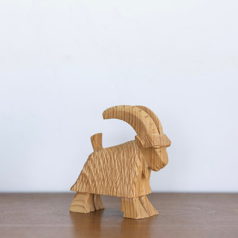 Carved wood yule goat