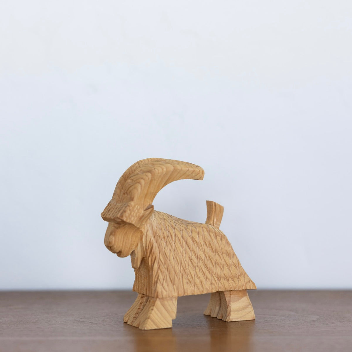 Carved wood yule goat