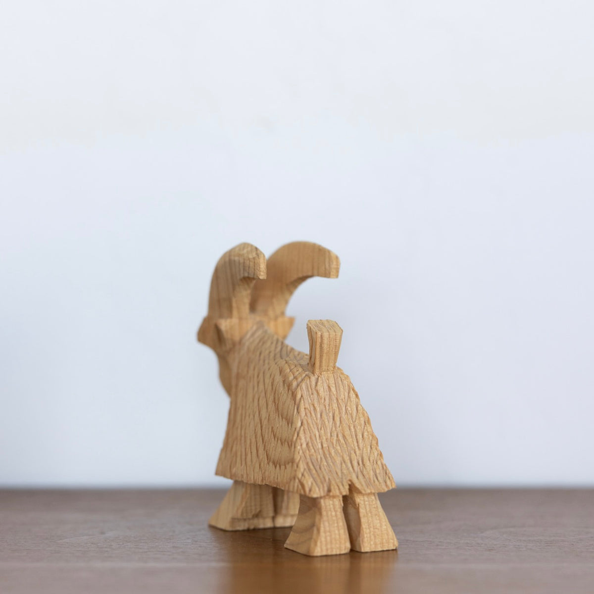 Carved wood yule goat