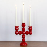 Red bobbin candelabra