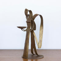 Brushed gold sculptural angel