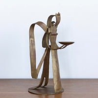 Brushed gold sculptural angel