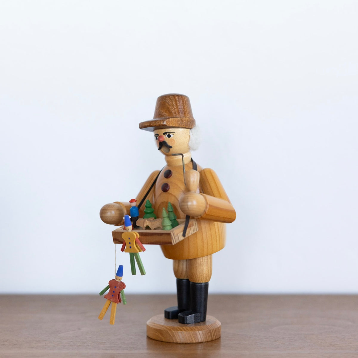 Toy maker smoker man