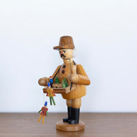 Toy maker smoker man