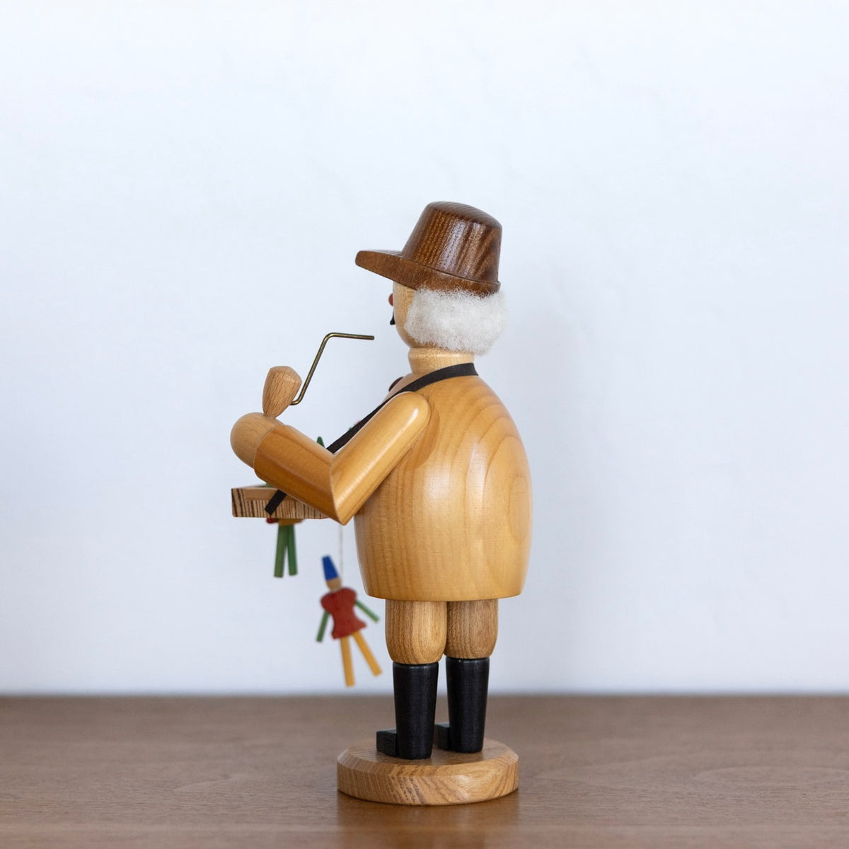 Toy maker smoker man