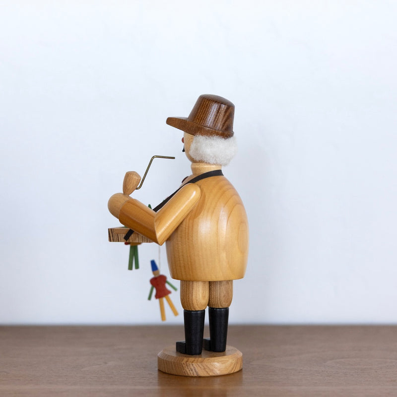 Toy maker smoker man
