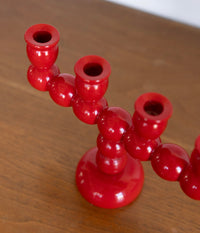 Long red bobbin candelabra