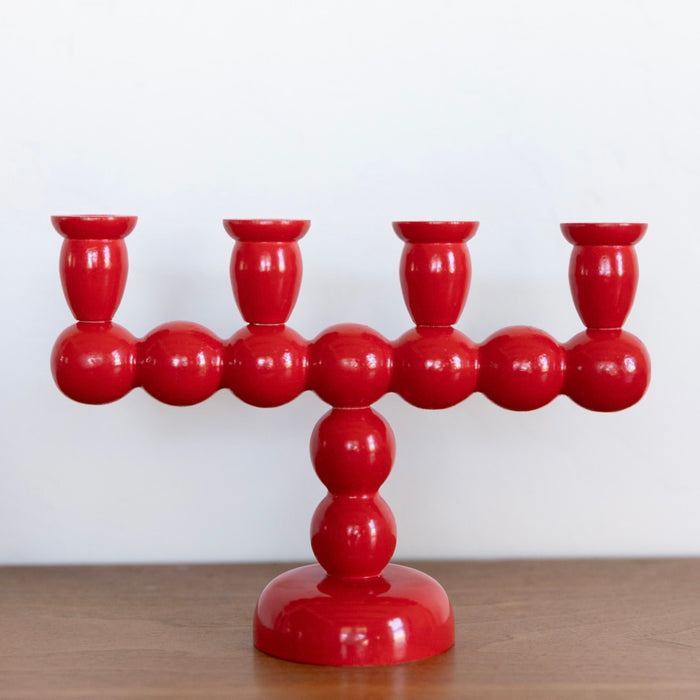 Long red bobbin candelabra