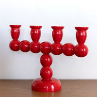 Long red bobbin candelabra