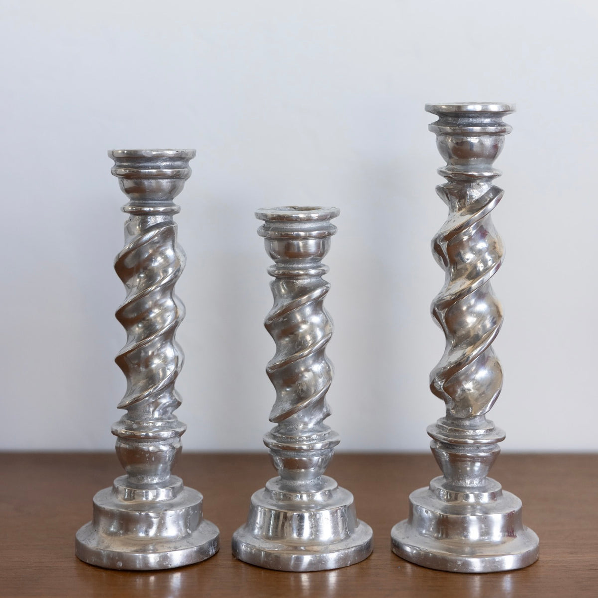 Twisted pewter candlesticks