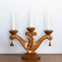 Carved folk art candelabra