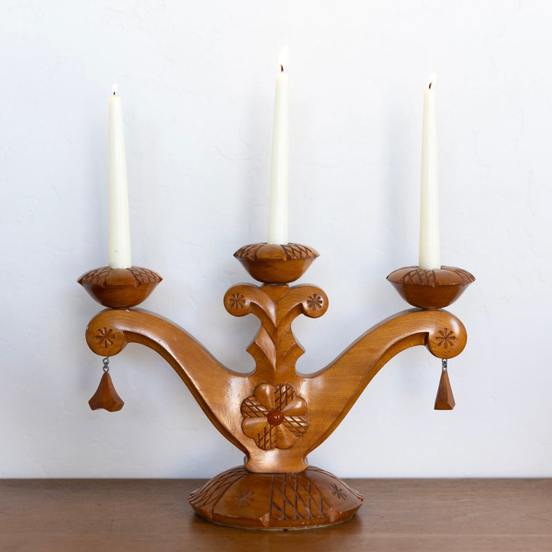Carved folk art candelabra
