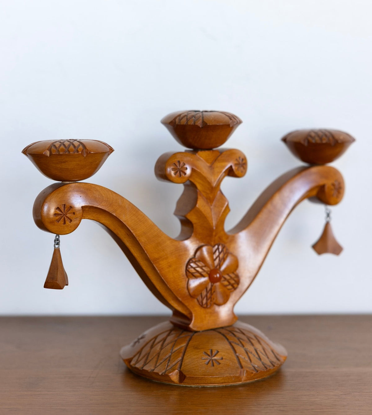 Carved folk art candelabra