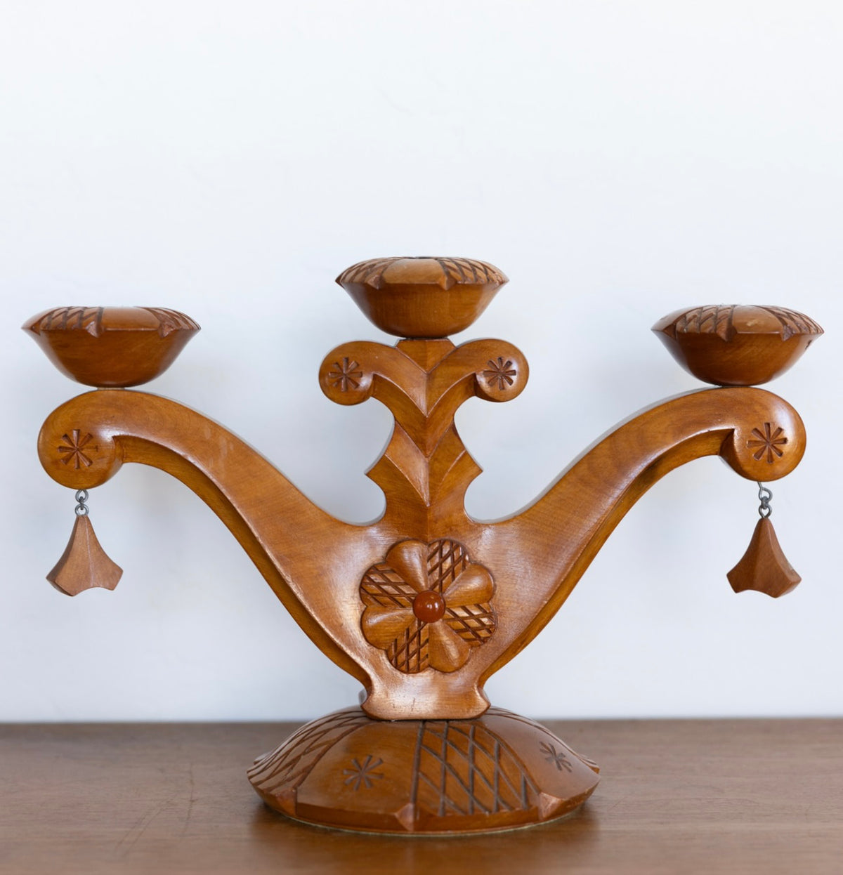 Carved folk art candelabra