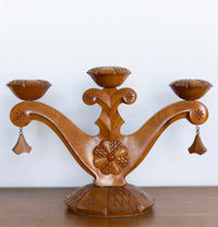Carved folk art candelabra