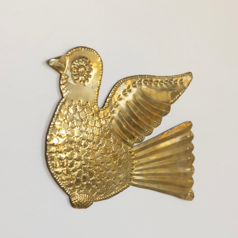 Embossed brass dove