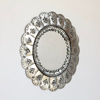 Scalloped punched tin mirror