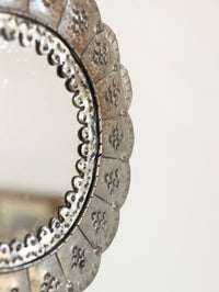 Scalloped punched tin mirror