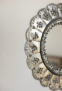 Scalloped punched tin mirror